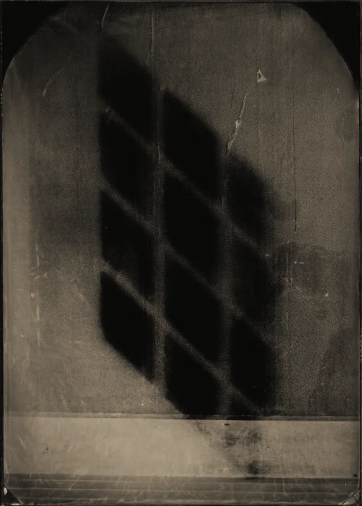 This image depicts a photograph by artist Ben Cauchi titled 'Black Light', an artwork made in 2015. The medium is ambrotype. The size of this artwork is 17.5x12.5 cm. This artwork was first shown in the exhibition 'Echo Chamber' at Ingleby Gallery in 2015.