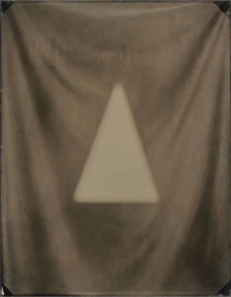 This image depicts a photograph by artist Ben Cauchi titled 'Metaphysica xi', an artwork made in 2021. The medium is ambrotype. The size of this artwork is 36x28 cm.